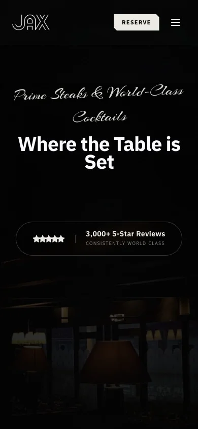 JAX Steakhouse website on a phone